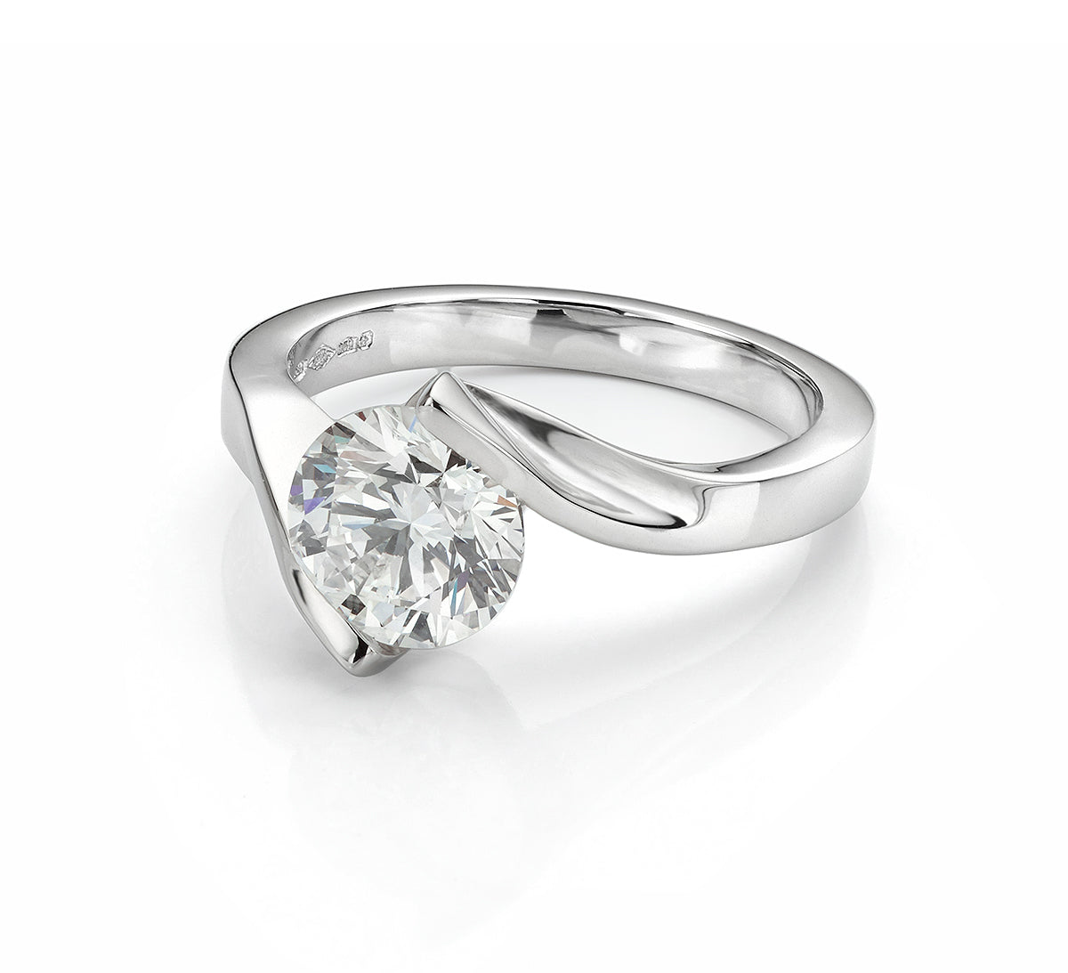 Custom Engagement Ring from Visualsoft Store with a round diamond set in a platinum band